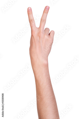 victory sign made with hand isolated on white