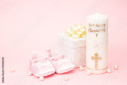 Christening candle with pink baby booties and gift box