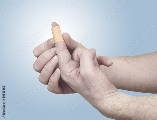 Tableau sur toile Healing plaster on finger.
