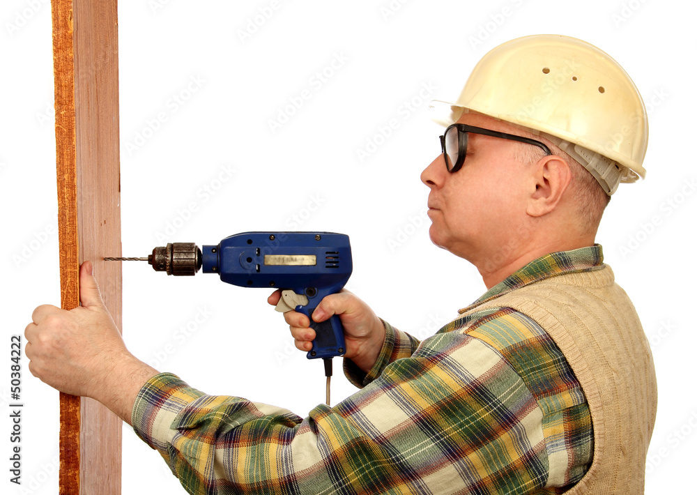 man with an electric drill. man with an electric drill.