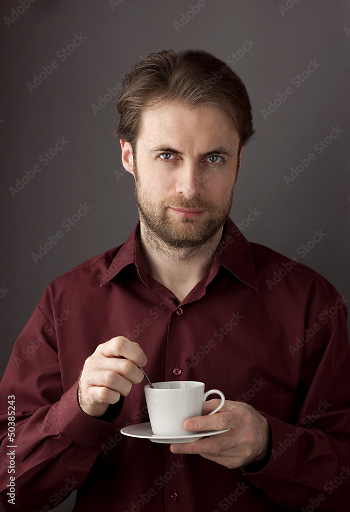 Forty years old business man drinking morning coffee Forty years old business man drinking morning coffee