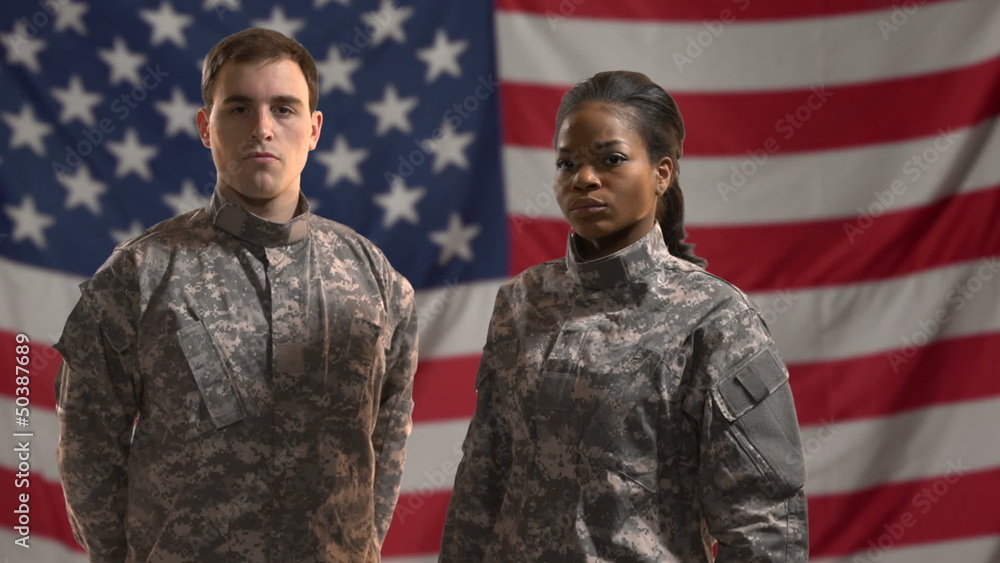 Soldiers in front of American flag. Soldiers in front of American flag.