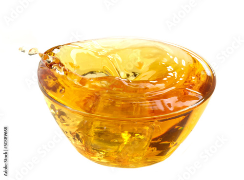 yellow apple juice in a glass bowl