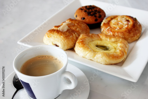 coffee cup  muffin and danish © mitrs3