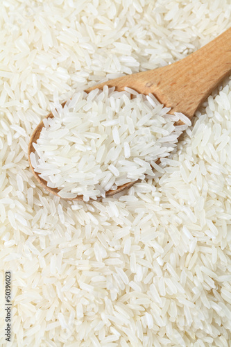 Rice with wooden spoon