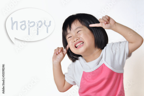 little asian girl smiling with "happy" word in speak bub © varandah