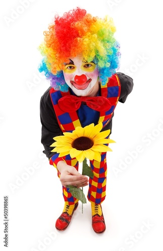 Clown with big yellow flower