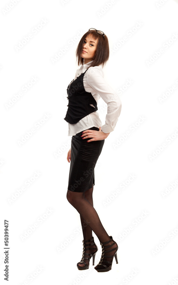Fototapeta premium Beautiful business woman standing on a white background.