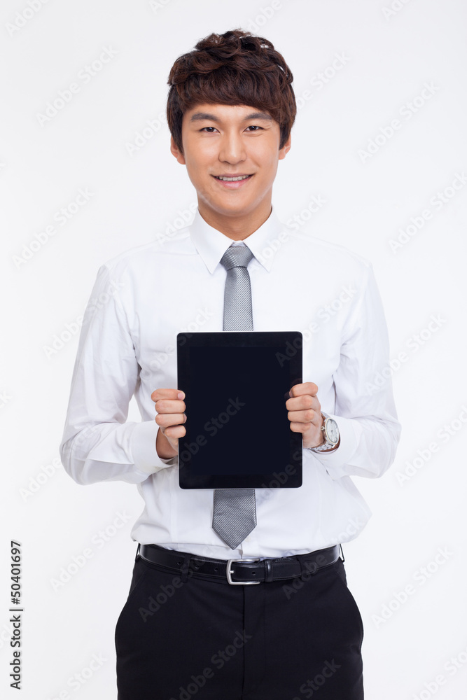 Young Asian business man showing a pad PC Young Asian business man showing a pad PC