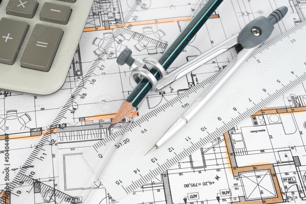 Architectural project, pair of compasses, rulers and calculator Architectural project, pair of compasses, rulers and calculator