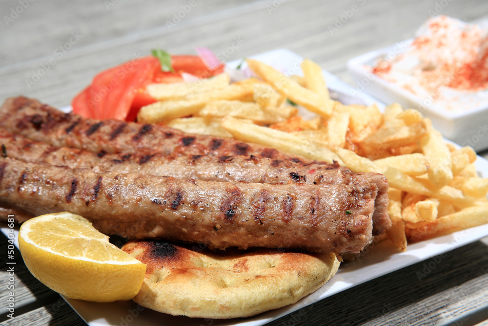 kebab with fried potatoes
