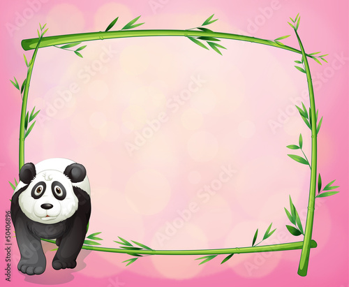 A panda beside a bamboo frame
