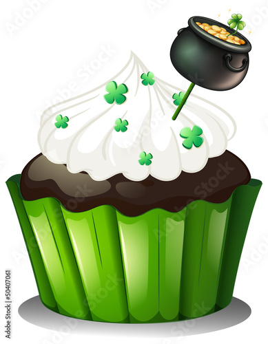 A chocolate cupcake with a pot full of coins