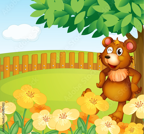 Fototapeta Naklejka Na Ścianę i Meble -  A bear standing near the flowers