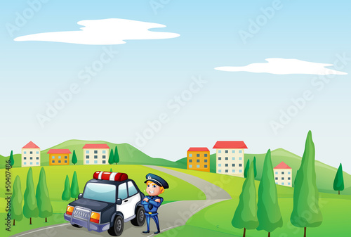 A policeman and his patrol car at the street