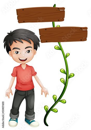 A boy with wooden signboards