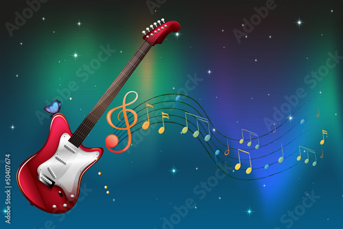 A red guitar with musical notes