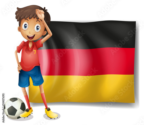 A football player in front of the flag of Germany