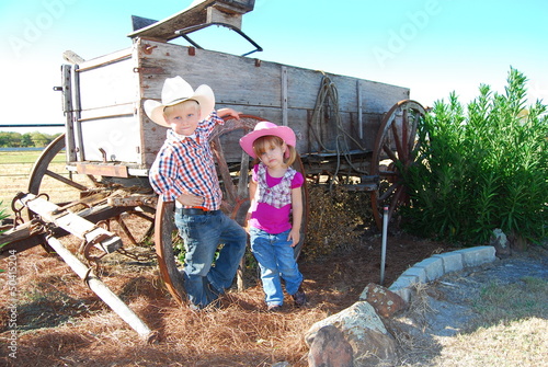 Child cowboy and cowgirl