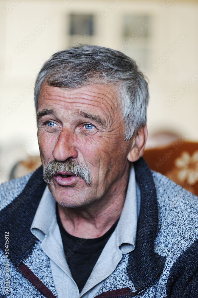 Portrait of old man with mustache Portrait of old man with mustache