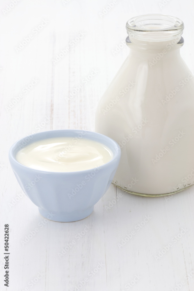 milk bottle and plain yogurt milk bottle and plain yogurt