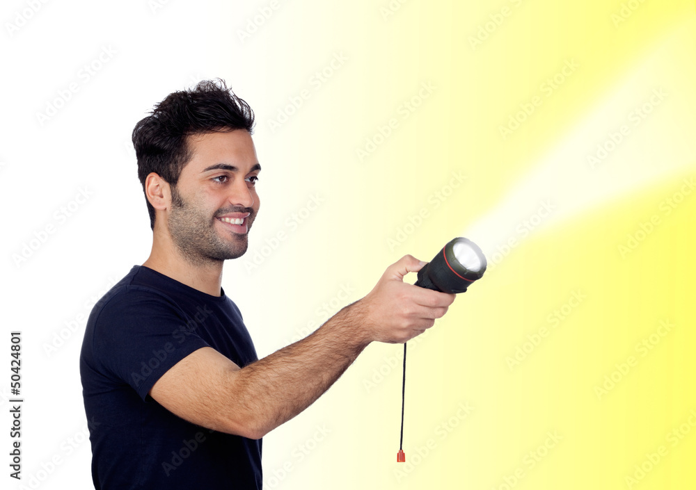 Attractive men in black with a flashlight looking for something Attractive men in black with a flashlight looking for something