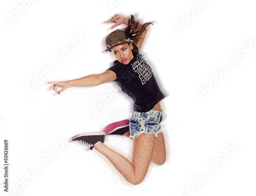 Young urban woman jumping