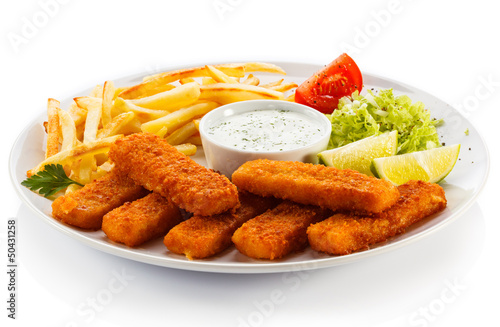 Photography Fried fish fingers, French fries and vegetables