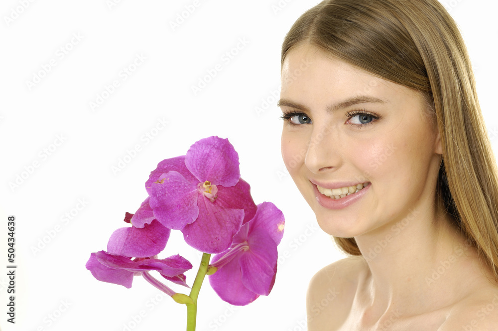 Woman with beautiful makeup and pink orchids. Woman with beautiful makeup and pink orchids.
