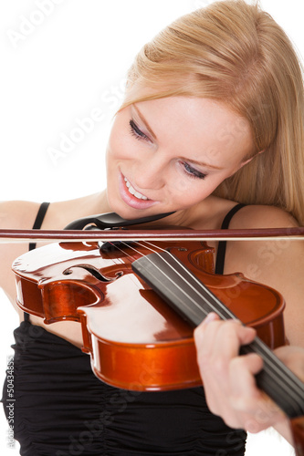 Beautiful young woman playing violin