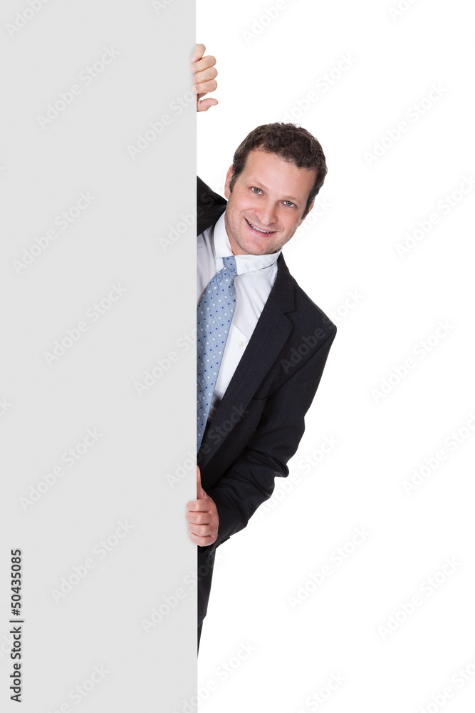 Successful businessman presenting empty banner Successful businessman presenting empty banner