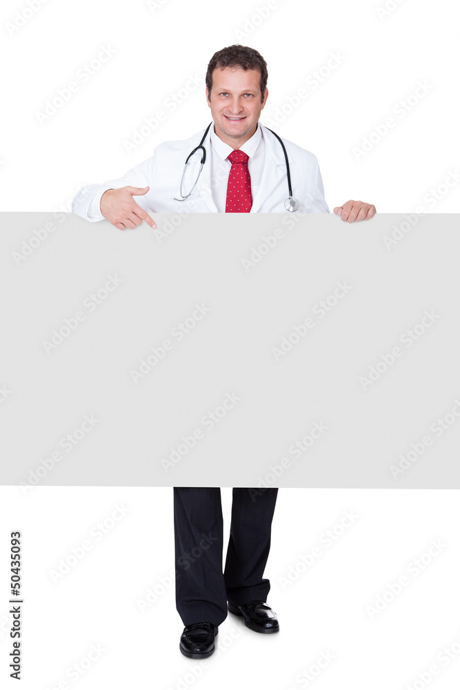 Confident doctor presenting empty banner Confident doctor presenting empty banner