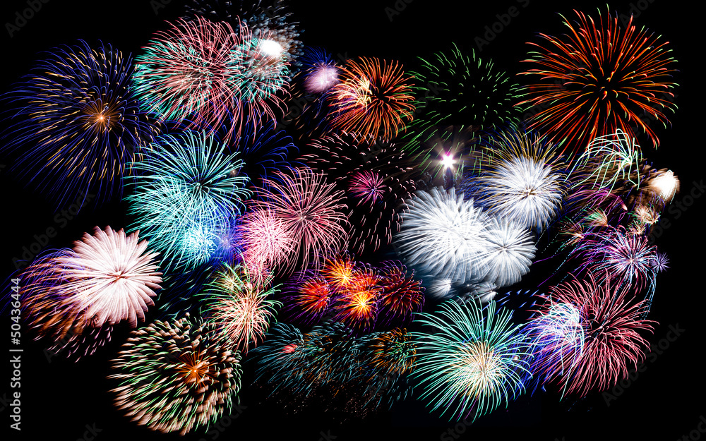 Fototapeta premium Colorful fireworks of various colors in night sky