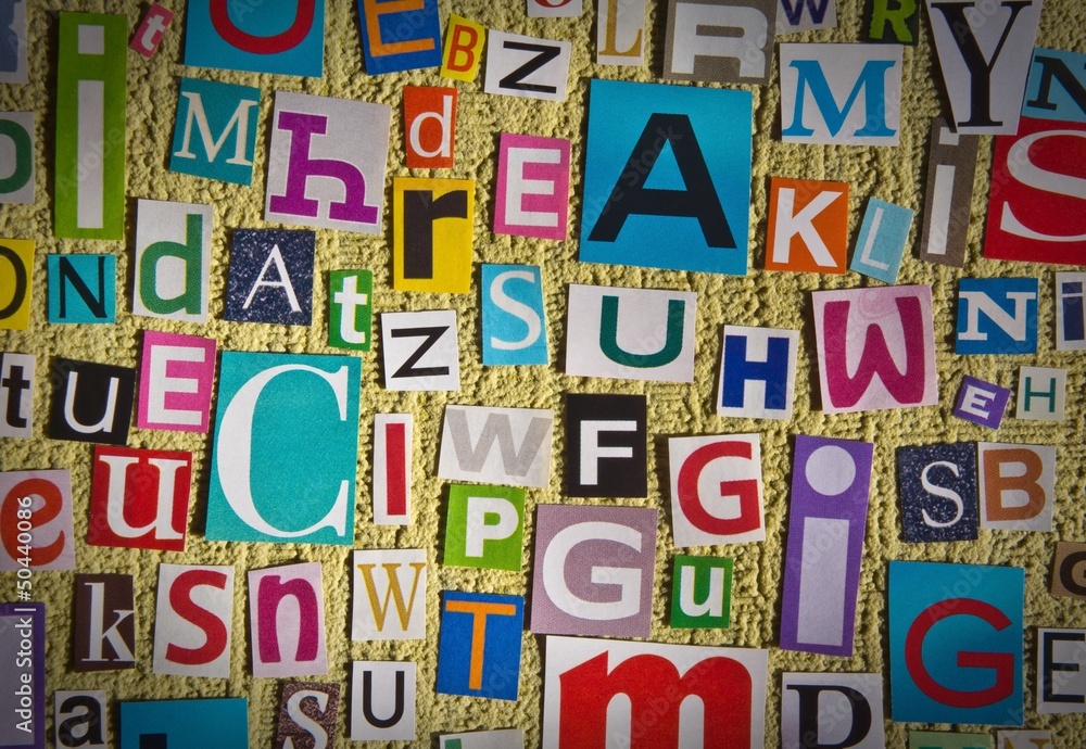 background with letters cut out of newspapers and magazines background with letters cut out of newspapers and magazines