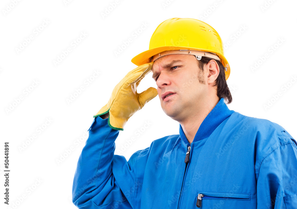 Young construction worker having a headache