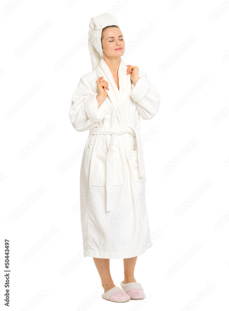 Full length portrait of relaxed young woman in bathrobe Full length portrait of relaxed young woman in bathrobe