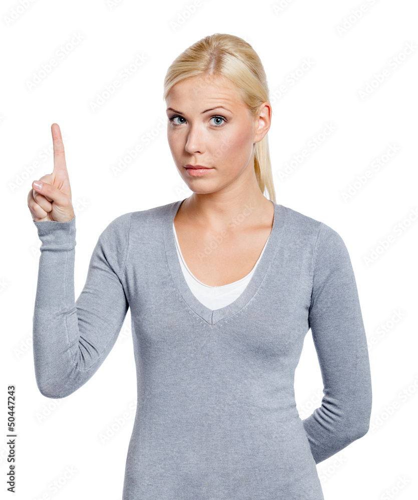Female making attention gesture with forefinger Female making attention gesture with forefinger