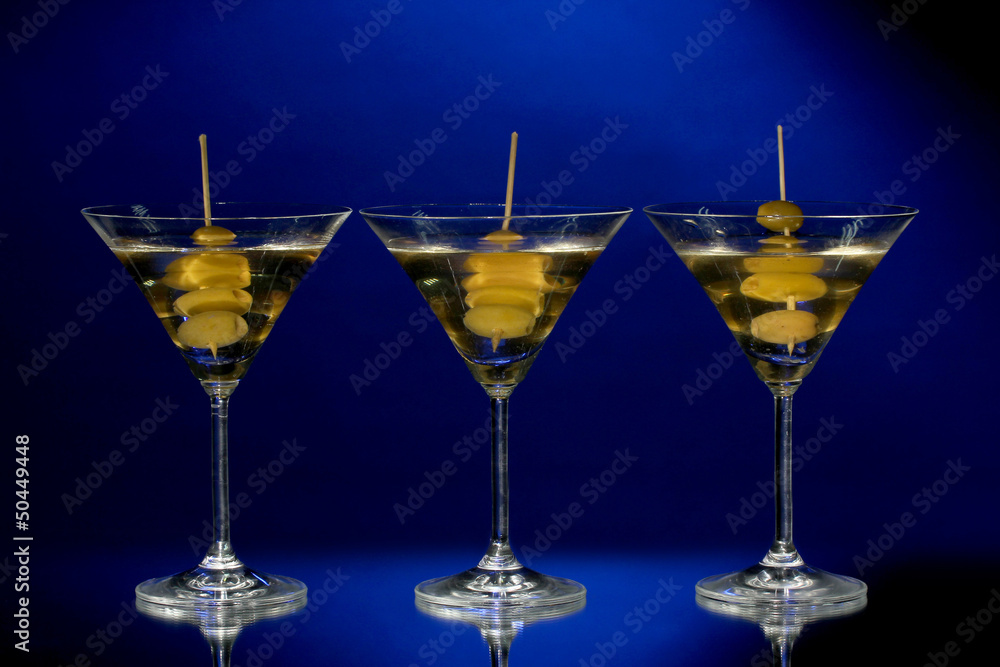 Martini glasses on dark background Martini glasses on dark background