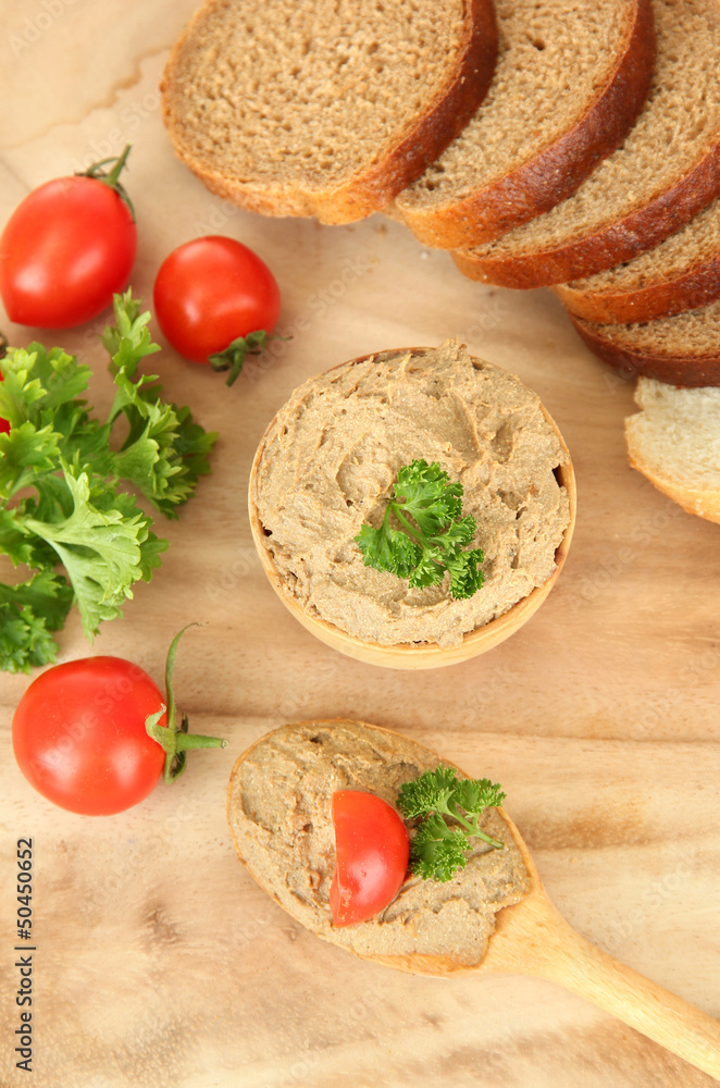Fresh pate on wooden spoon, on wooden background Fresh pate on wooden spoon, on wooden background