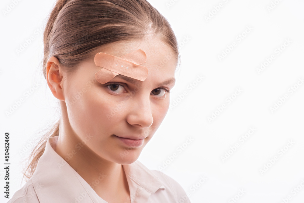A woman with an injury on his forehead A woman with an injury on his forehead