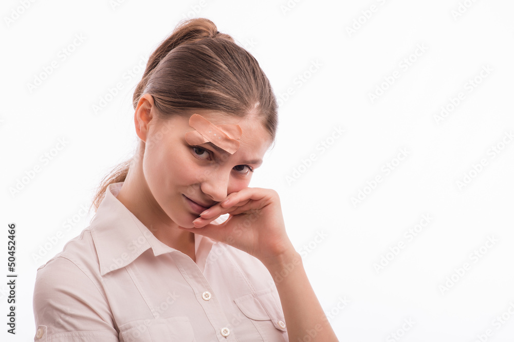 A woman with an injury on his forehead