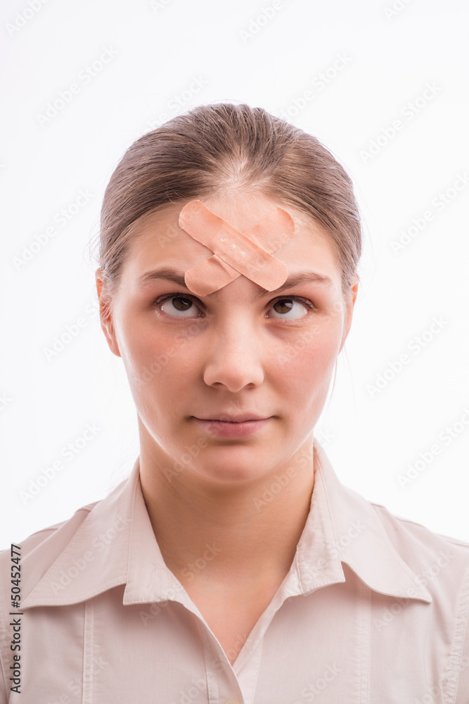 A woman with an injury on his forehead A woman with an injury on his forehead