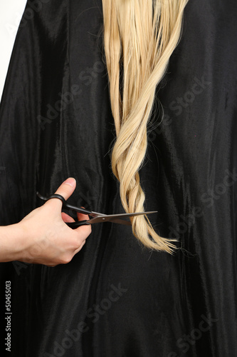Haircut blond hair on white background