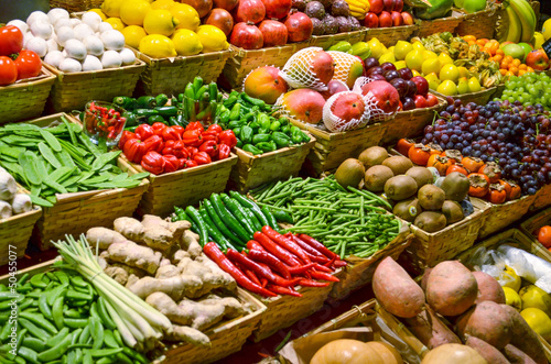 Billede på lærred Fruit market with various colorful fresh fruits and vegetables