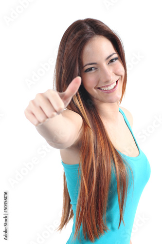 Beautiful happy teenager with thumb up