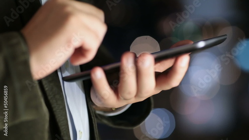 working on tablet-pc with shallow depth of field