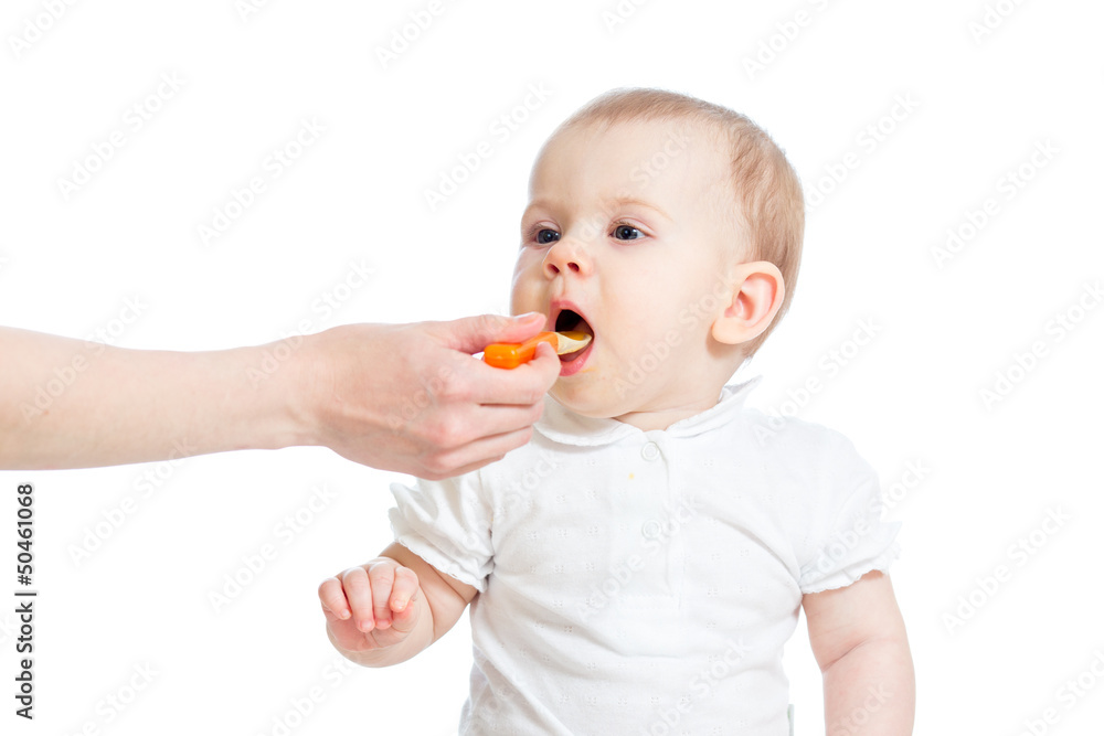 Little baby feeding with a spoon Little baby feeding with a spoon