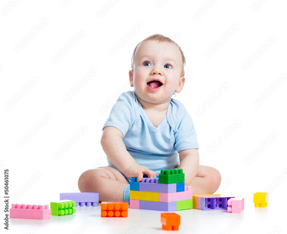kid boy playing with construction set over white background kid boy playing with construction set over white background