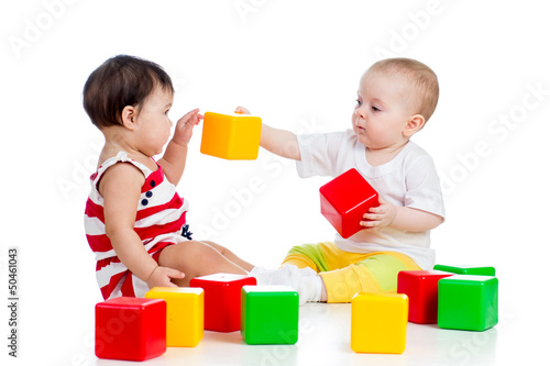 two babies or kids playing ...
