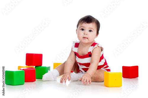 little girl playing with bu...